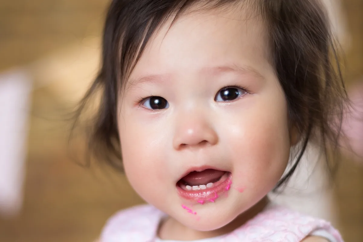 Close-up of decorated smash cake during a cake smash photography session